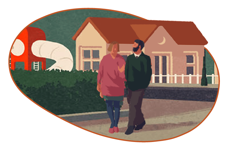 Couple in front of house